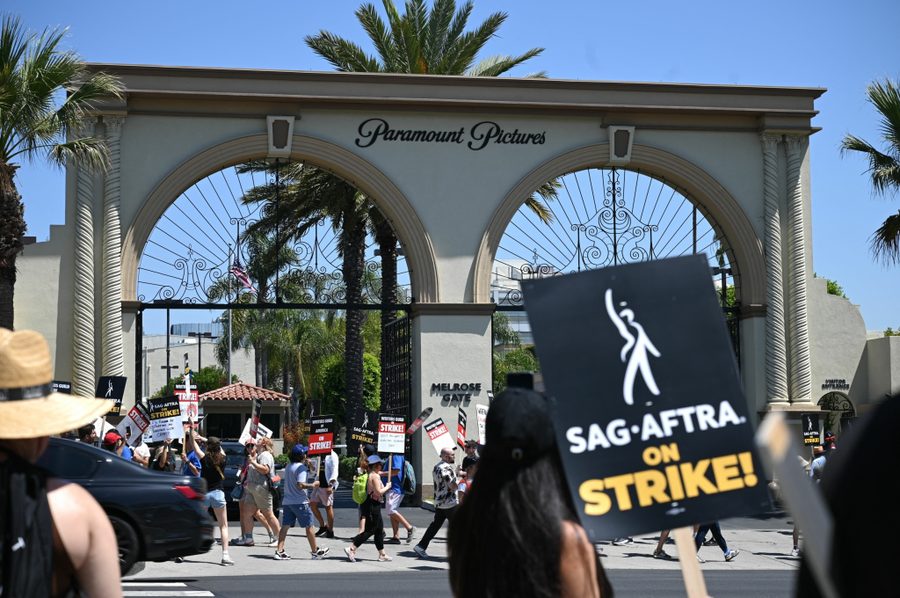 Members of the Writers Guild of America and the Screen Actors Guild walk the picket line outside Paramount Studios in Hollywood, California, on July 20, 2023.
(PHOTO BY ROBYN BECK/AFP VIA GETTY IMAGES)